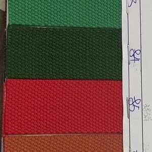 May include: A color chart of 11 different fabric swatches. The swatches are arranged vertically from top to bottom. The colors are black, purple, yellow, orange, green, dark green, red, brown, pink, blue, and neon green. The chart is labeled with numbers 71, 80, 81, 82, 83, 84, 85, 86, 87, 88, and 89.