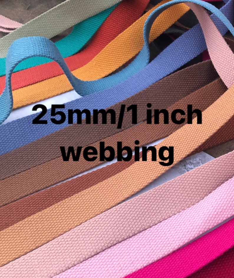 May include: A variety of colors of 25mm/1 inch wide cotton webbing. The webbing is woven and has a textured surface.