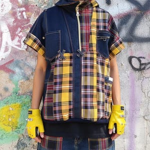 Sweat-shirt unisexe sans manches en patchwork de denim recyclé