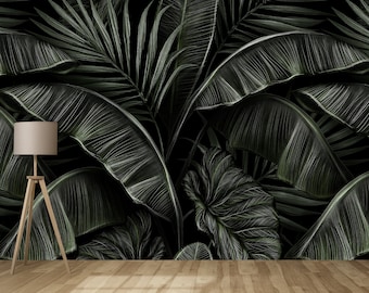 Abstracte donkere tropische behangmuurschildering in zwart-groen met botanische bananenbladeren. Wanddecoratie voor woonkamer en slaapkamer. Zelfklevend / vliesbehang.