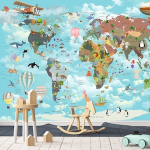 May include: A colorful world map with cartoon animals and illustrations of airplanes, hot air balloons, and ships. The map is on a blue background with white clouds. There are also some wooden toys in the foreground, including a rocking horse and a toy car.
