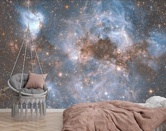 May include: A bedroom interior design with a hanging chair and a bed with a brown blanket. The wall is a mural of a galaxy with stars and nebulae.