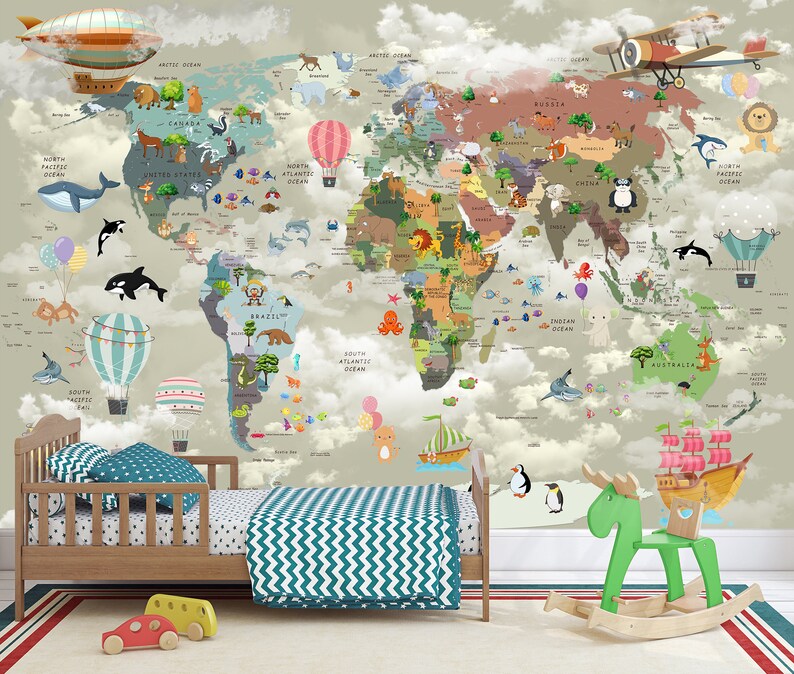 May include: A wall mural featuring a colorful world map with illustrations of animals, hot air balloons, airplanes, and ships set against a cloudy sky background. The map displays continents and oceans with various cartoon creatures placed across regions.