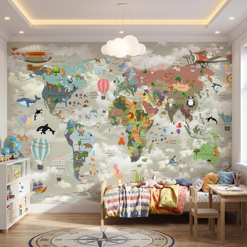 May include: A wall mural featuring a world map with colorful continents, various animals, hot air balloons, and an airplane. The map includes labels for oceans and continents, set against a background of soft white clouds and a light beige sky.