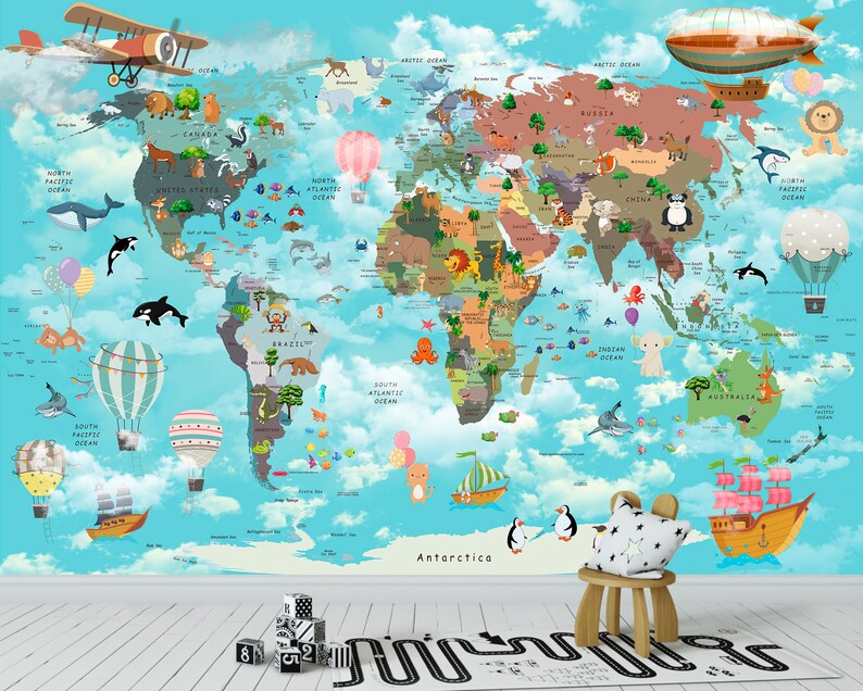 May include: A colorful world map with animals and cartoon illustrations. The map is on a blue background with white clouds. There are hot air balloons, a plane, and a ship on the map. The map is surrounded by a white border.