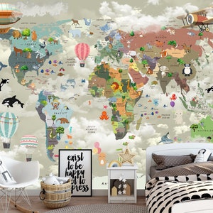 May include: A wall mural featuring a colorful world map with cartoon animals, hot air balloons, and airplanes set against a cloudy sky. A framed sign with the text "exist to be happy not to impress" sits on the floor near a white chair and bed.
