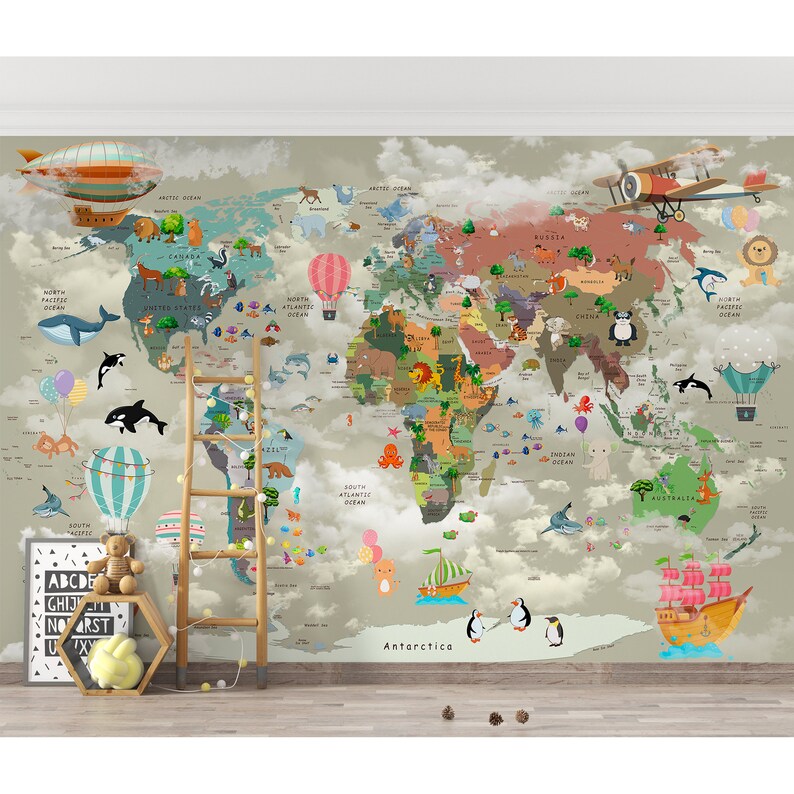 May include: A wall mural featuring a world map with colorful continents, various animals, hot air balloons, an airplane, and a ship. The map is overlaid with a cloudy sky effect. A wooden ladder and a small shelf with a teddy bear are in the foreground.