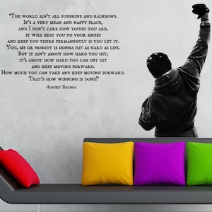 May include: Black and white motivational quote from the movie Rocky Balboa. The quote reads, "The world ain't all sunshine and rainbows. It's a very mean and nasty place, and I don't care how tough you are, it will beat you to your knees and keep you there permanently if you let it. You, me or nobody is gonna hit as hard as life. But it ain't about how hard you hit, it's about how hard you can get hit and keep moving forward. How much you can take and keep moving forward. That's how winning is done!" -Rocky Balboa