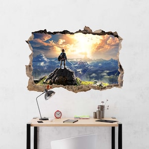 Puede incluir: Un adhesivo de pared con efecto 3D que muestra un agujero en la pared revelando un paisaje. Una figura se encuentra sobre un pico rocoso con vistas a un valle con monta&ntilde;as, un puente y un cielo al atardecer. Los bordes parecen estar rasgados.