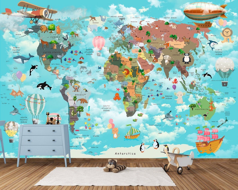 May include: A colorful world map with illustrations of animals, plants, and landmarks. The map is on a blue background with white clouds. There are hot air balloons and a small airplane in the sky. The map is surrounded by a white border.