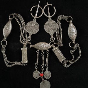 Antique berber silver fibulas made of 2 old Moroccan coins (dated 1320 & 1336 AH) and silver chain with silver ornaments, early 1900s