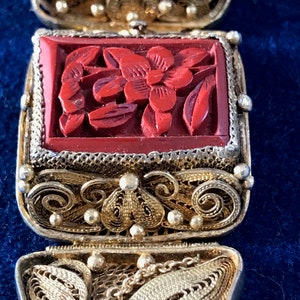 Chinese siver gilded filigree panel bracelet with carved red cinnabar stones