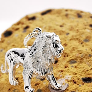 Lion Charm Antiqued Sterling Silver Lion Charm Antiqued Sterling Silver