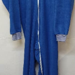 May include: A blue fleece one-piece sleepwear with a zipper closure and white trim around the neck and cuffs.