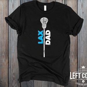 May include: Black t-shirt with a white lacrosse stick and the words "LAX DAD" printed vertically on the stick.
