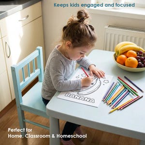 child coloring banana worksheet at table, preschool activity printable, kids learning fruits