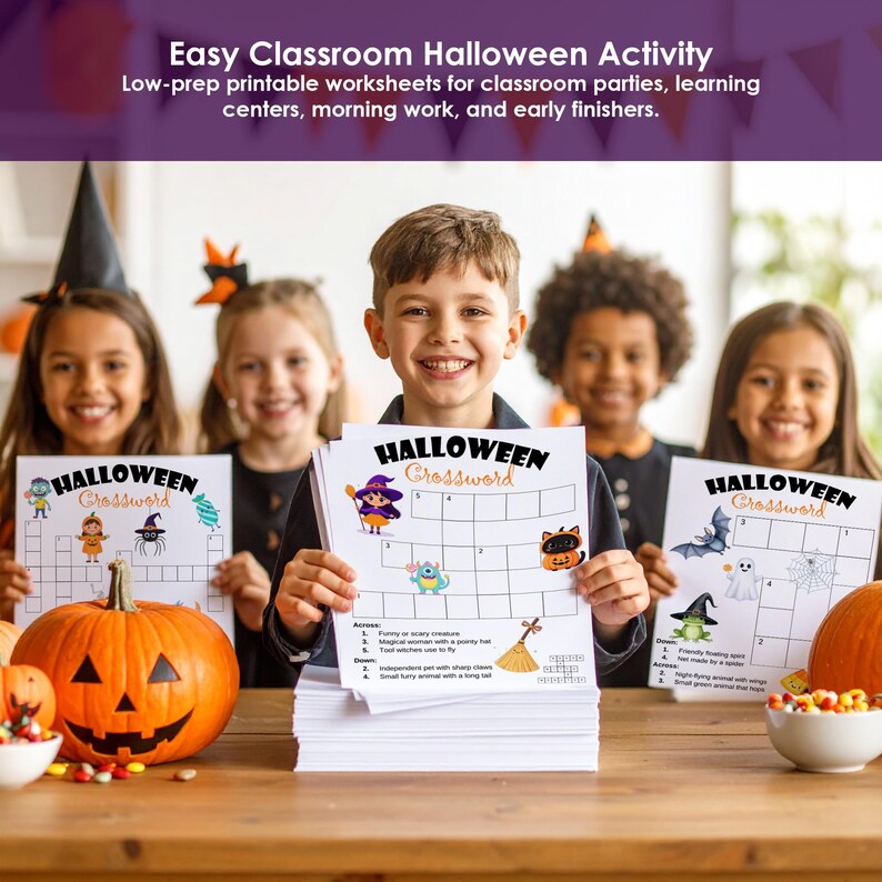 Kids holding Halloween crossword worksheets at a classroom party with pumpkins and seasonal decorations.