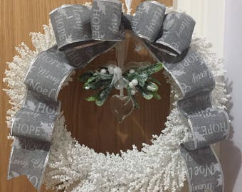 Artificial Christmas wreath. White and Silver