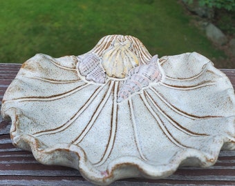 A shell dish for soap, rings, small trinkets. Hand shapped pottery. Slabbuilding fun.