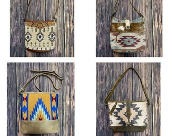 May include: Four different patterned crossbody bags with leather straps. The bags are all different colors and patterns, including brown, white, blue, and yellow.