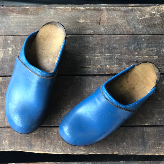 blue leather clogs