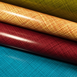 Może przedstawiać: Zbliżenie na cztery rolki wzorzystego materiału. Górna rolka jest złotożółta z czerwonymi liniami krzyżowymi. Poniżej znajduje się rolka pomarańczowego materiału z czerwonymi liniami. Trzecia rolka jest głęboko czerwona, a dolna turkusowa z niebieskimi liniami.