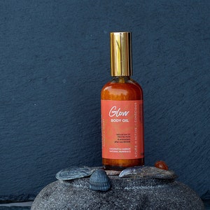 Biologische antioxidant lichaamsolie wortel en kokosnoot zonbescherming natuurlijke glow bruiningsolie