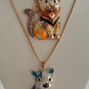 Betsy Johnson Brooch Pendant Dog & Cat Pendant Enamel Necklace 24” Goldtone Chains Rhinestones/ Crystals Hallmark Betsey Johnson See Remarks
