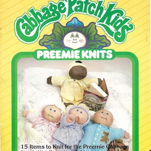 May include: A vintage knitting pattern booklet for Cabbage Patch Kids Preemie Knits. The cover features a Cabbage Patch Kid doll with a yellow knitted outfit and a book. The text on the cover reads "Cabbage Patch Kids Preemie Knits". The text below the dolls reads "15 Items to Knit for the Preemie Cabbage Patch Kids. Includes Blankets, Dresses, Sleepers, Booties, Bonnets, and Many More."