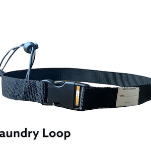 May include: Black laundry loop with a black buckle and a white label that says "MADE IN AUSTRALIA" and "NAME".