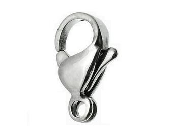 May include: Silver-toned metal lobster clasp with a spring-loaded closure. The clasp is designed for attaching jewelry or other items to a chain or cord.