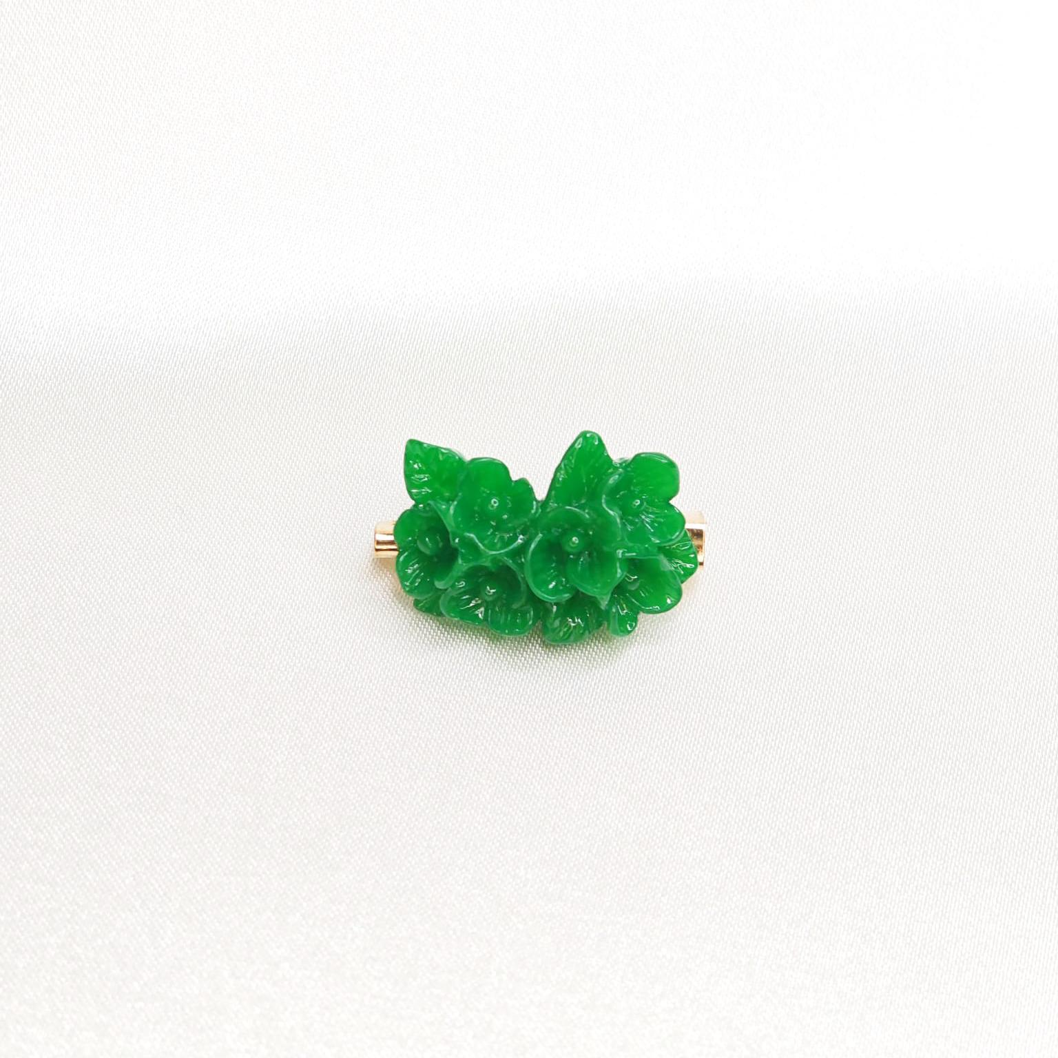Resin sculpted floral emerald brooch