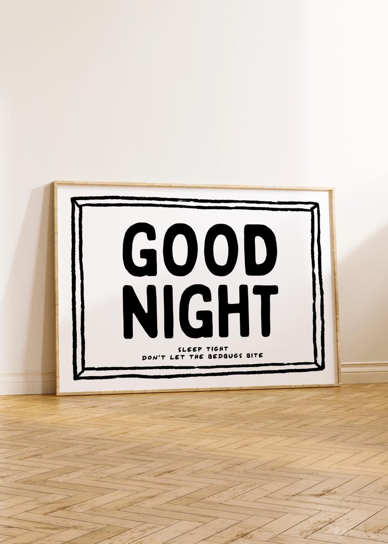 May include: Black and white framed print with the text "GOOD NIGHT" and the smaller text "SLEEP TIGHT DON'T LET THE BEDBUGS BITE".