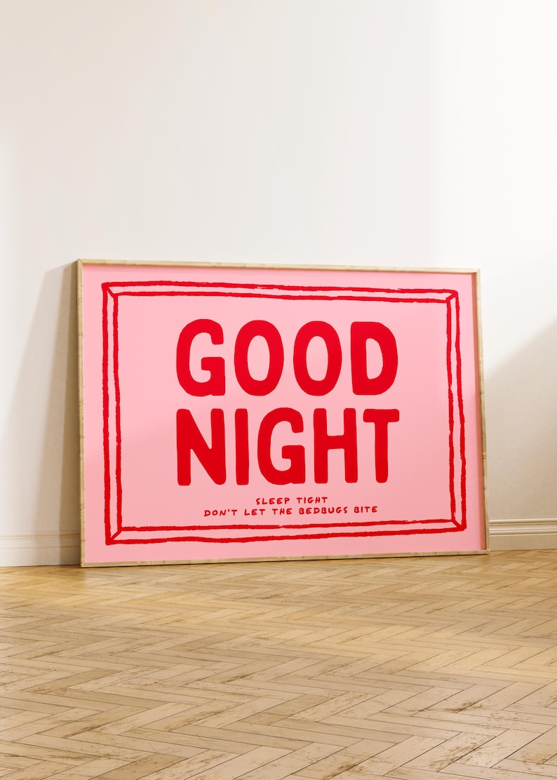 May include: A framed pink and red print with the text "GOOD NIGHT" and the smaller text "SLEEP TIGHT DON'T LET THE BEDBUGS BITE".