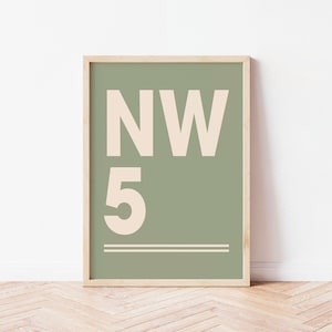 May include: A framed print with a green background and white text. The text reads "NW 5" with a line underneath.