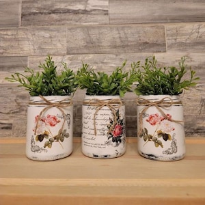 Set of three handcrafted vintage looking glass jars/vases with flowers. Farmhouse decor. Shabby chic cottage decor. Spring/Summer decor.