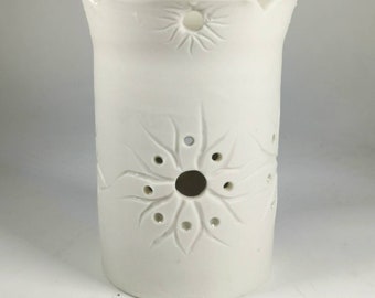 Handmade porcelain  candleholder carved and pierced, thrown and altered