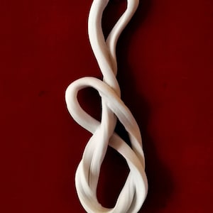 Abstract porcelain wall sculpture.
