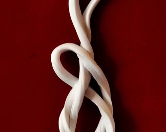 Abstract porcelain wall sculpture.