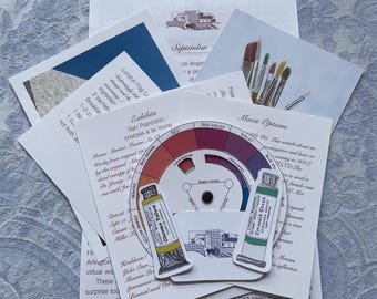 May include: A circular color wheel chart featuring a central rotating dial, accompanied by two die-cut stickers of paint tubes in chrome yellow and emerald green. The items are layered over several printed informational sheets with text and illustrations.