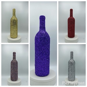 Bottiglia di vino glitterata o barattolo di vetro decorativo