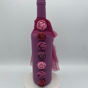 Plum decorated bottle