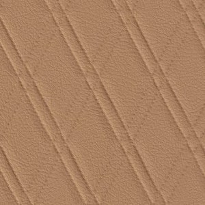 May include: Close-up of a tan leather material with a diagonal stitched pattern. The leather has a textured surface and the stitching creates raised lines across the material. The color is a warm, neutral tone.