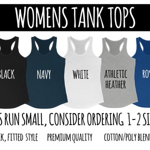 May include: Five racerback tank tops in black, navy, white, athletic heather gray, and royal blue. The text "WOMENS TANK TOPS" is at the top. The text "TANKS RUN SMALL, CONSIDER ORDERING 1-2 SIZES UP" is at the bottom.