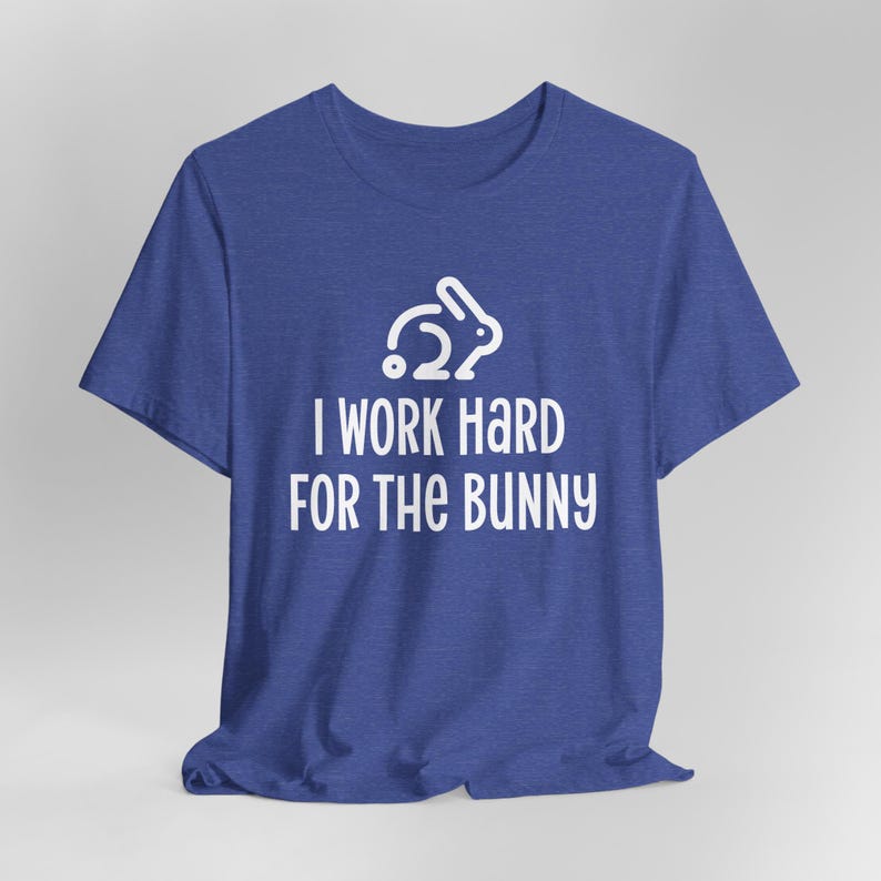 Royal blue graphic t-shirt with rabbit design that says I Work Hard For The Bunny.