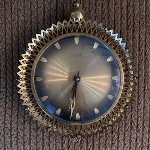 Very rare vintage Atlanta starburst clock. Brass 1960’s wall clock, made in West Germany. manual movement