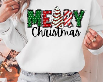 May include: White sweatshirt with a green, red, and white Christmas tree design and the text "Merry Christmas".