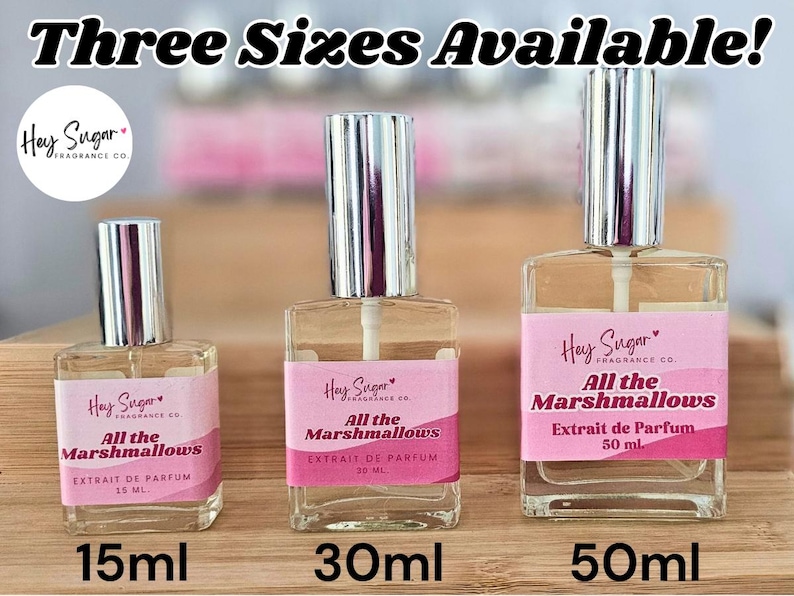 May include: Three clear glass perfume bottles with silver caps and pink labels that read "Hey Sugar" and "All the Marshmallows." Sizes are 15ml, 30ml, and 50ml. The text "Three Sizes Available!" is at the top.
