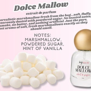 May include: A clear glass perfume bottle with a round gold cap and a label reading Dolce Mallow, accompanied by a pile of white marshmallows. The text describes the scent as a photorealistic marshmallow with notes of powdered sugar and vanilla.