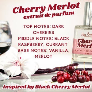May include: An image promoting "Cherry Merlot" fragrance. It features a perfume bottle, a wine glass with red liquid, cherries, and text listing fragrance notes. The text reads "Inspired by Black Cherry Merlot."